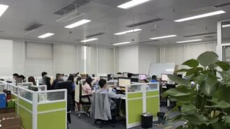 cardboard box factory design and production team working together